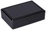 Preview: Es handelt sich um eine rechteckige, flache Box in Schwarz. Sie hat einen glatten, planmäßigen Deckel und eine schlichte, moderne Form. Die Oberfläche ist glänzend und leicht reflektierend.