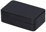 Preview: Das Bild zeigt eine rechteckige, schwarze Box mit glatten Oberflächen und abgerundeten Ecken. Sie hat einen Deckel, der auf die Unterseite passt. Die Box wirkt elegant und schlicht.