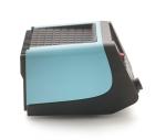 Preview: The image shows a compact device with a blue, rounded side and a black grid-like surface. It has a simple shape and could be some type of kitchen appliance or electronic equipment.