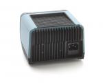 Preview: The image depicts a compact, square device with a smooth, blue top and a ridged back. A socket is visible on the bottom. It appears modern and functional.