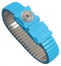 Preview: The image displays a bracelet-like object in light blue with a flexible structure. It features a round metal eyelet in the center and a wavy surface that is pleasant to touch.