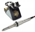 Preview: The image shows a soldering iron with a gray handle and a pointed soldering tip. Next to it is a soldering iron stand with a metal cleaning spiral and a sponge area.