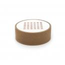 Preview: It is a round, flat container with a brown cardboard edge. The top surface is white and displays a pattern of small, colored dots in a grid-like design.