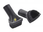 Preview: The image shows two black brush attachments. Both have a sturdy handle. One has soft bristles, the other is wide and has a rounded shape with rubber edges.