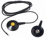 Preview: The image shows an electrical component with two round discs: one with a yellow dot and one without. They are connected by a long, black cable.