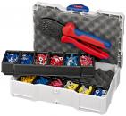 Preview: The image shows an open toolbox. Inside the toolbox, there is a crimping tool with red and blue handles, as well as several compartments with wire terminals in various colors: red, blue, yellow.