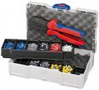 Preview: The image shows a blue and gray toolbox. Inside, there is a pair of pliers with red and blue handles, as well as several compartments with various terminals in different colors.