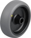 Preview: The image shows a wheel. The outer side is gray and has a smooth surface. In the center, there is a black axle with a small hole. On the gray surface, there is a yellow dot.