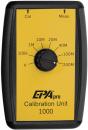 Preview: The image shows a yellow calibration device with a black casing. In the center, there is a large dial with various numerical markings (1M to 200M) and two arrows at the top for calibration and measurement.