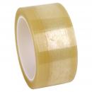 Preview: The image shows a roll of transparent tape. The surface is slightly glossy and has a yellowish tint. The roll has an inner core and is cylindrically shaped.