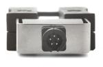 Preview: The image shows a metallic plug with a round socket that has five metallic contacts. The plug is framed in a gray holder with black edges.