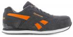 Preview: Der Schuh ist ein grauer Sneaker aus weichem Material mit orangefarbenen Details. Er hat eine sportliche Form, Schnürsenkel und eine weiße Sohle, die ihm Stabilität verleiht.
