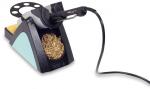Preview: The image displays a soldering tool on a stable base. It features a holder for the soldering iron and below that, a gold-colored cleaning spiral. A sponge is also included.