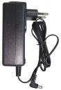 Preview: Das Bild zeigt ein schwarzes Netzteil mit zwei Steckdosen-Pins an einer Seite und einem Kabel, das zu einem runden Stecker führt. Das Kabel ist gewellt und bewegt sich seitlich.