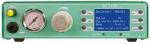 Preview: The image shows a green device with a digital display, a pressure gauge, several buttons, and a rotary control. It is likely used for dosing or controlling a process.