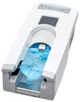 Preview: The image shows a white dispenser for disposable items, likely for sanitary papers. On the top side are buttons, beneath which is a compartment with blue wipes, partially visible.