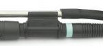 Preview: The image shows a plug and a cable. The plug is black with a blue ring. A metallic rod runs alongside it, partially covered by a black rubber protector.