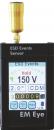 Preview: The image shows a device called EM Eye, which is used for measuring electrostatic discharges (ESD). It has a small screen displaying measurements and an antenna on top.